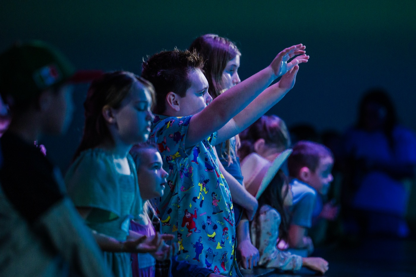 Kids worshipping at CityKids