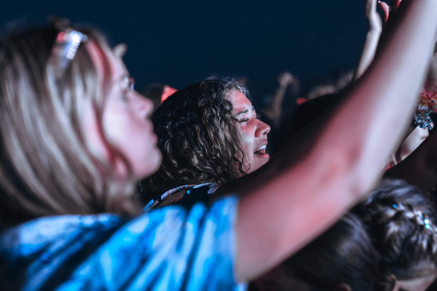 A student worshipping at CYC