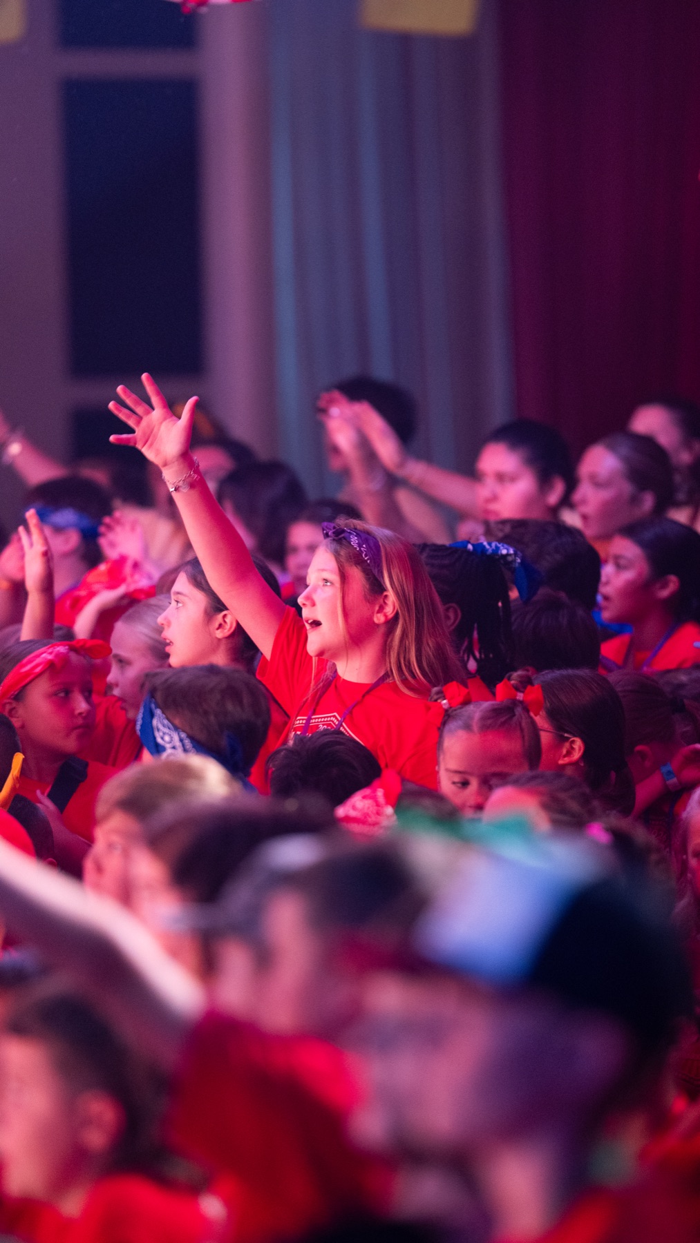 A young camper worshipping at KidCon